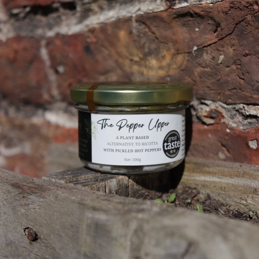 A plant based alternative to ricotta with pickled hot peppers.